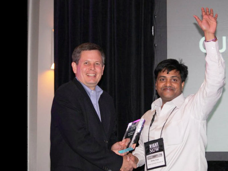 Venky Vijay Reddi receiving the memento from Senior VP, Steve Daines